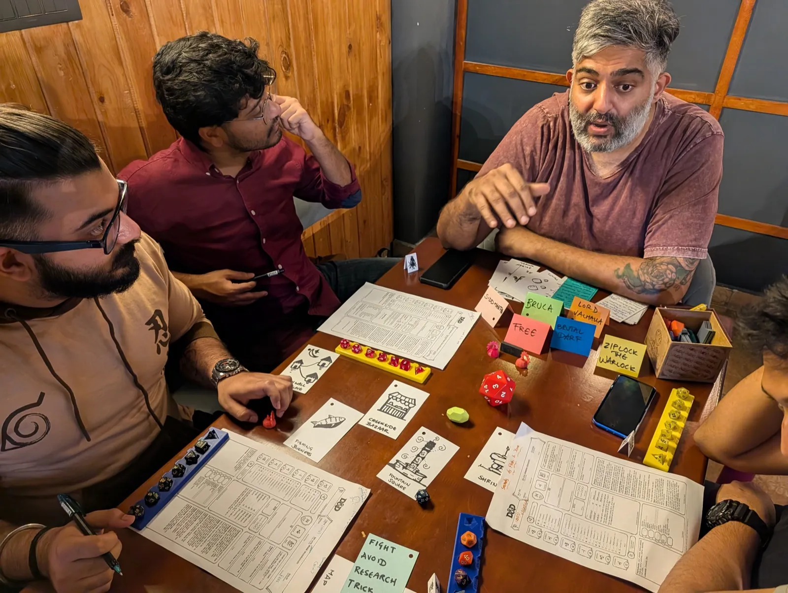 Facilitated tabletop role-playing session with an engaged group of players