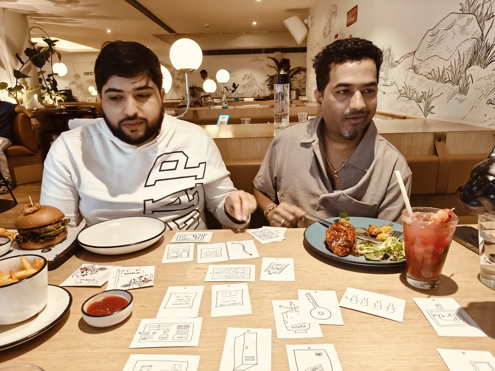 Two players enjoying a card game across a table